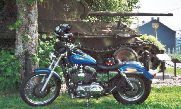 Sportster in front of a Panther in the Ardennes