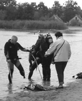 Co LeDahu whashes ashore with scuba outfit